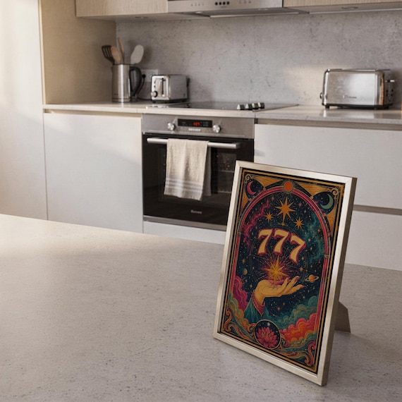 777 angel number wall art print framed and displayed in a modern home interior.