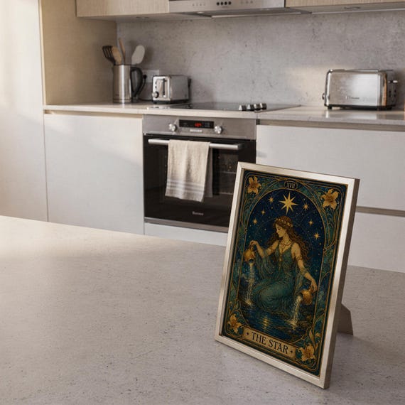 The star tarot card wall art print framed and displayed in a modern home interior.