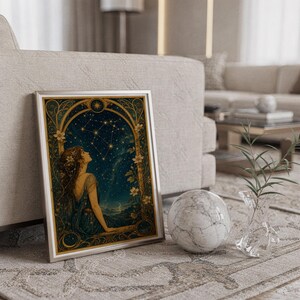 Celestial woman wall art print standing on a countertop in a modern white kitchen.