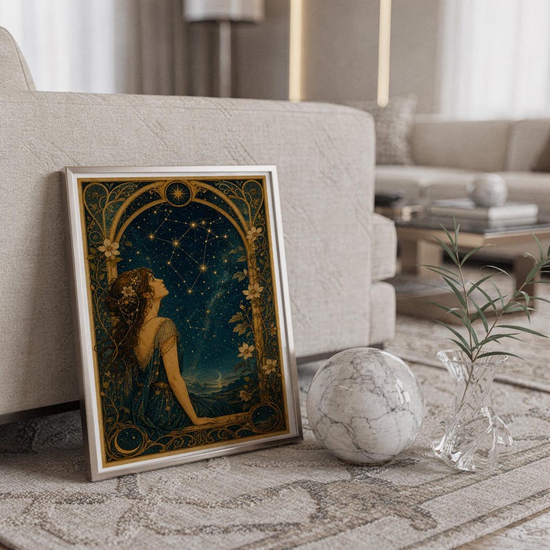 Celestial woman wall art print standing on a countertop in a modern white kitchen.