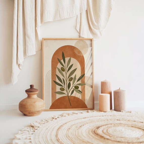 Terracotta arch olive branch print resting on floor with boho woven rug