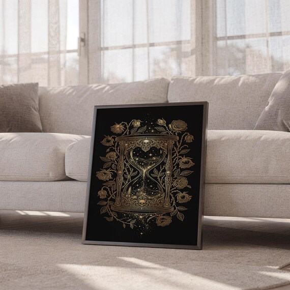 Gothic hourglass wall art print leaning against a white sofa in a bright living room with sheer curtains.