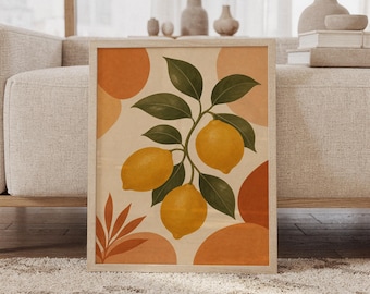 Peut inclure: Une impression d'art encadrée représentant une branche centrale avec trois citrons jaunes et des feuilles vert foncé. Le fond se compose de formes abstraites dans des tons orange, pêche et crème, avec un petit brin de plante couleur terre cuite.