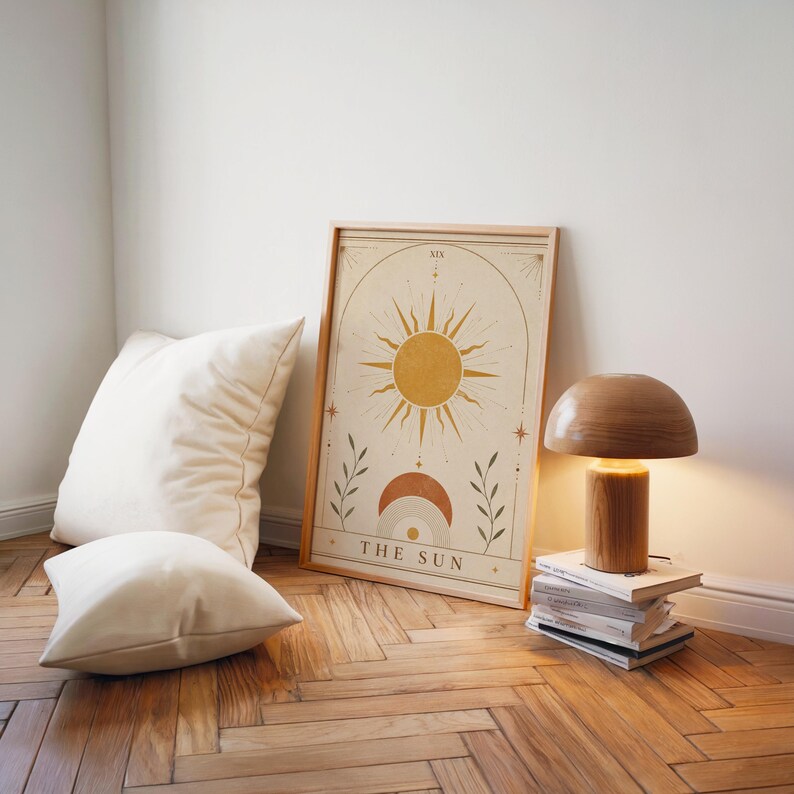 Boho bedroom wall decor framed sun print on parquet floor with white pillows and lamp