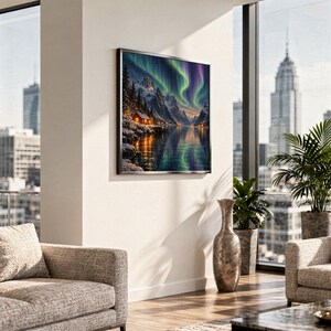 Aurora borealis mountain landscape wall art print hanging in a high-rise apartment living room with a city skyline view.