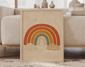 Puede incluir: Una impresión de arte mural rectangular enmarcada que presenta una ilustración gráfica centrada de un arcoíris con cuatro arcos distintos en tonos apagados de terracota, naranja, amarillo y verde salvia, sobre dos nubes de color beige.