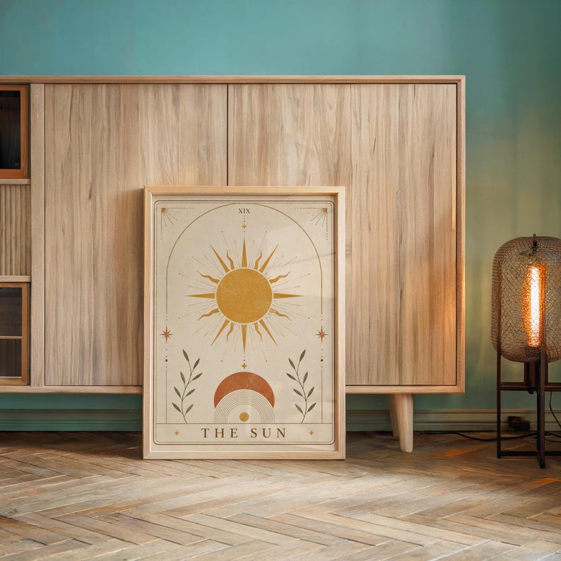 Minimalist sun tarot poster framed on wooden console table in modern interior decor