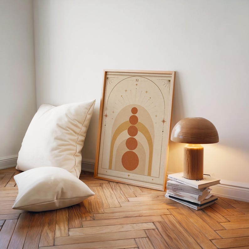 Earth tone geometric arch print on parquet floor with white pillows and floor lamp.