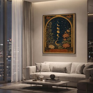 Moon phase wall art print hanging above a light gray sofa in a modern living room with evening city views through tall windows.
