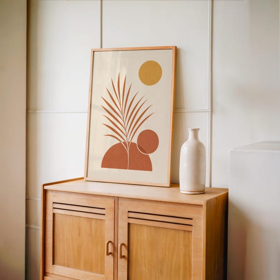 Boho terracotta palm leaf print set on vintage wooden sideboard console
