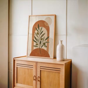 Boho olive branch wall art set on vintage wooden sideboard console