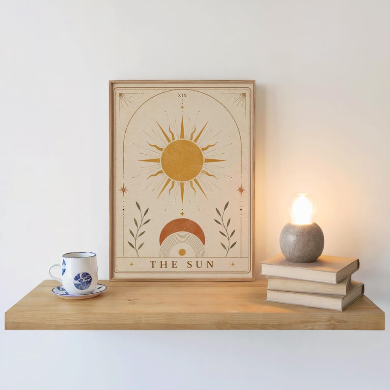 Modern bohemian sun wall print framed on shelf next to coffee cup and diffuser