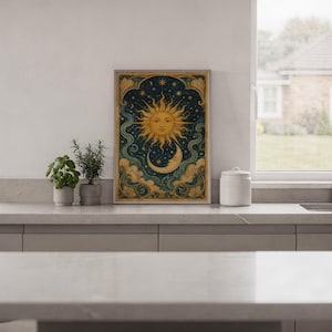 Celestial sun and moon wall art print hanging in a high-rise apartment living room with a city skyline view.