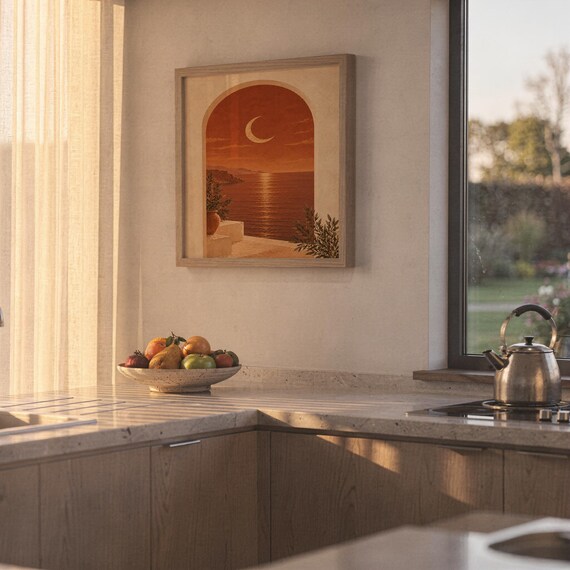 Mediterranean crescent moon arch print hanging in a high-rise apartment living room with a city skyline view.