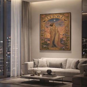 The L Etoile art nouveau poster hanging on a living room wall above a modern sofa and coffee table at dusk.