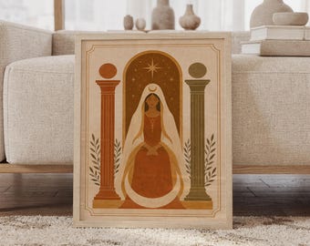 May include: A framed wall art print featuring a central figure in a hooded robe standing between two classical columns. The illustration uses a warm color palette of terracotta, cream, and sage green, incorporating celestial motifs like a star and moon.