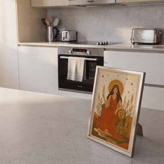Celestial goddess wall art print framed and displayed in a modern home interior.
