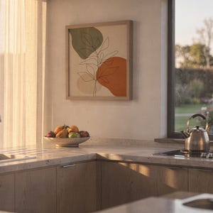 Mid century modern botanical poster hanging on sunlit kitchen wall decor
