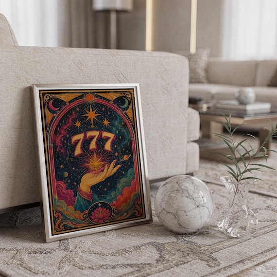 777 angel number wall art print standing on a countertop in a modern white kitchen.