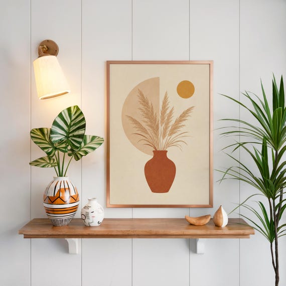 Boho pampas wall art on floating wooden shelf above indoor green plants