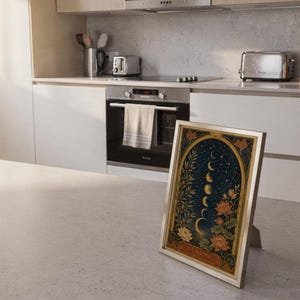 Moon phase wall art print framed and displayed in a modern home interior.