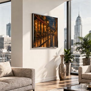 Paris eiffel tower wall art print hanging in a high-rise apartment living room with a city skyline view.