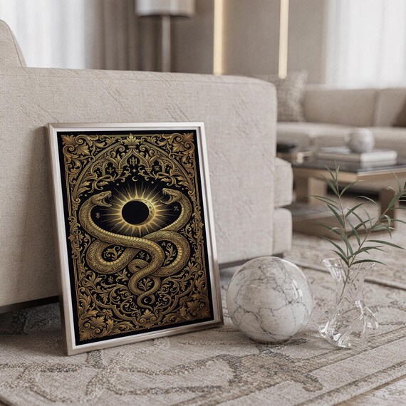 Occult snake wall art print standing on a countertop in a modern white kitchen.