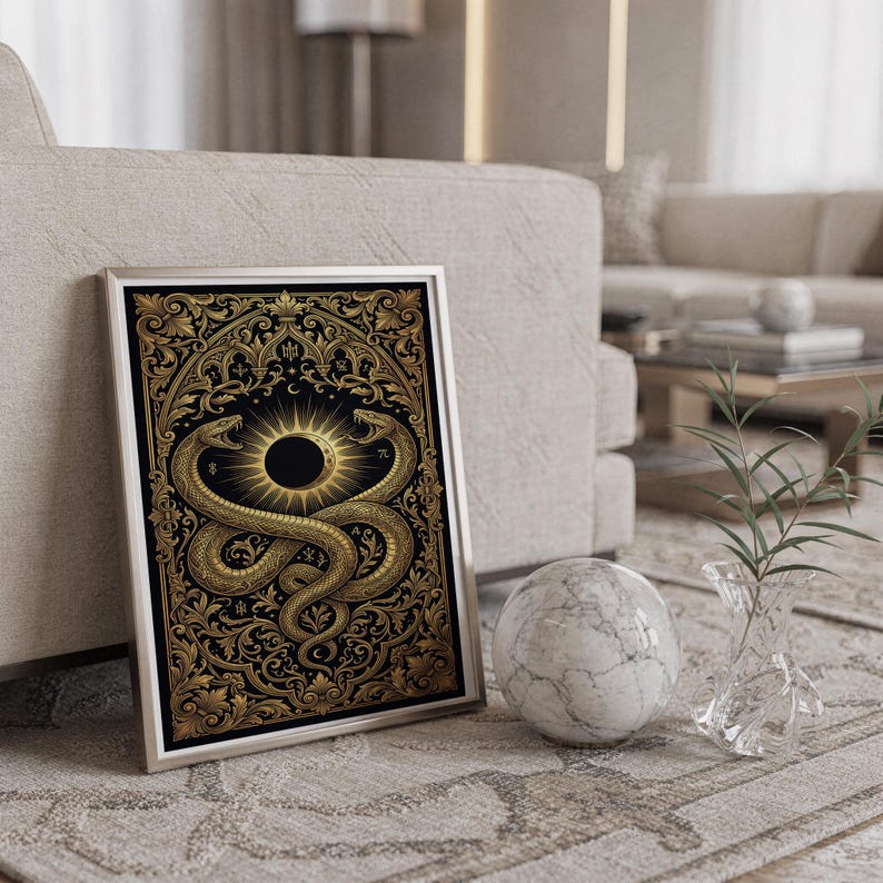 Occult snake wall art print standing on a countertop in a modern white kitchen.