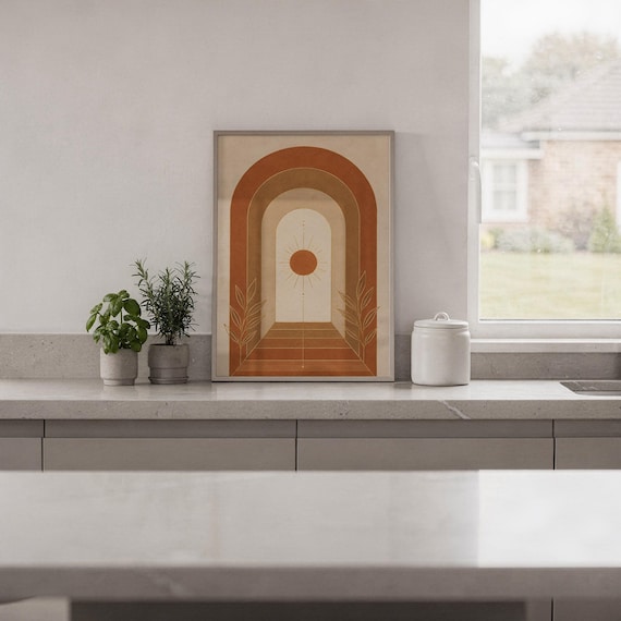 Boho arch sun wall art print hanging in a high-rise apartment living room with a city skyline view.