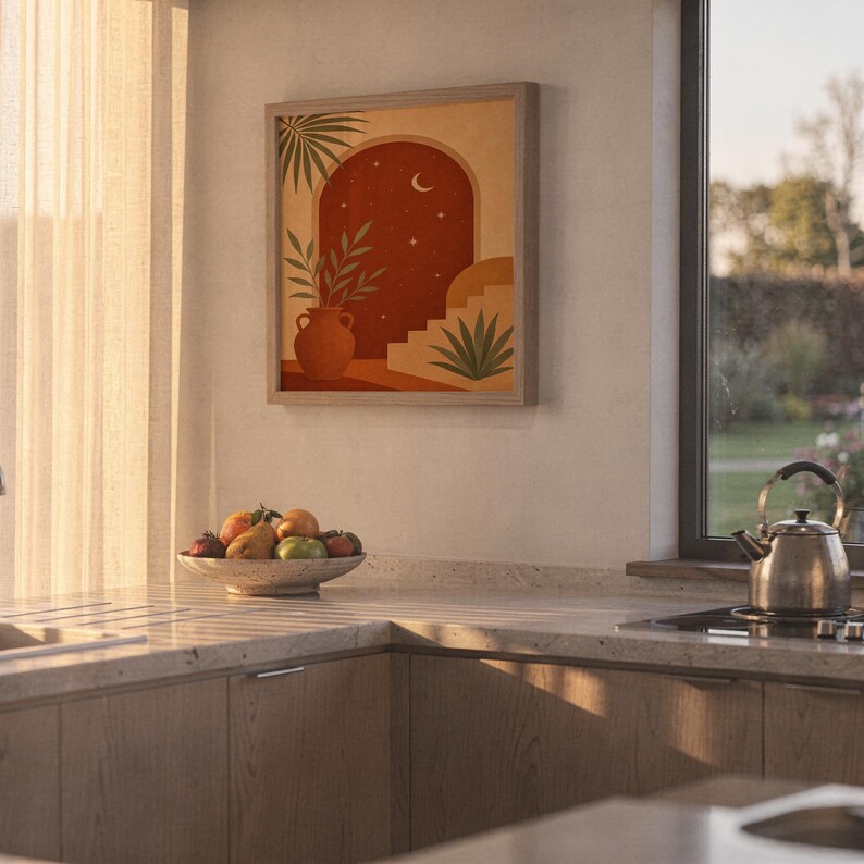 Terracotta moon and stars arch art print hanging in a high-rise apartment living room with a city skyline view.