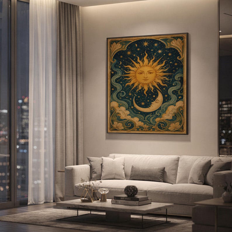 Celestial sun and moon wall art print hanging above a light gray sofa in a modern living room with evening city views through tall windows.