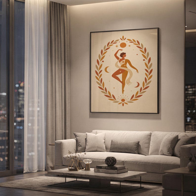 Framed celestial dancing woman art print hanging above a beige sofa in a luxury apartment living room with city night view.