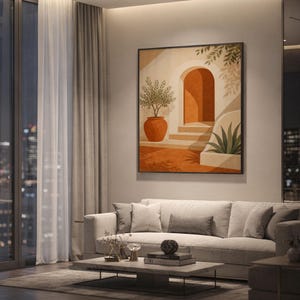 Mediterranean terracotta stairway arch print showing a sunlit terracotta arch with a curved stairway, a clay pot and leafy plants in sand, cream and olive tones, hanging above a light gray sofa in a modern living room with evening city views through tall windows.