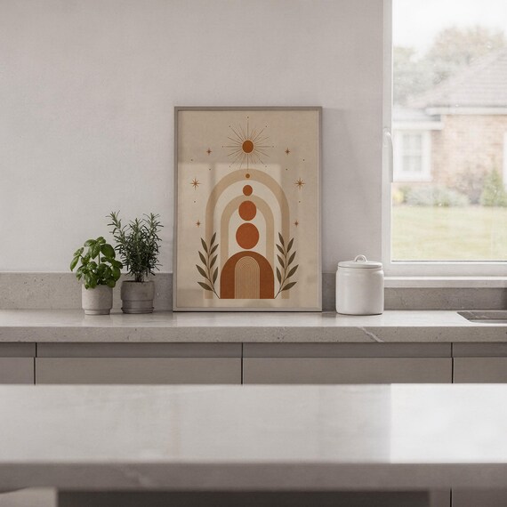 Minimalist terracotta geometric poster framed on white kitchen counter against clean wall decor.