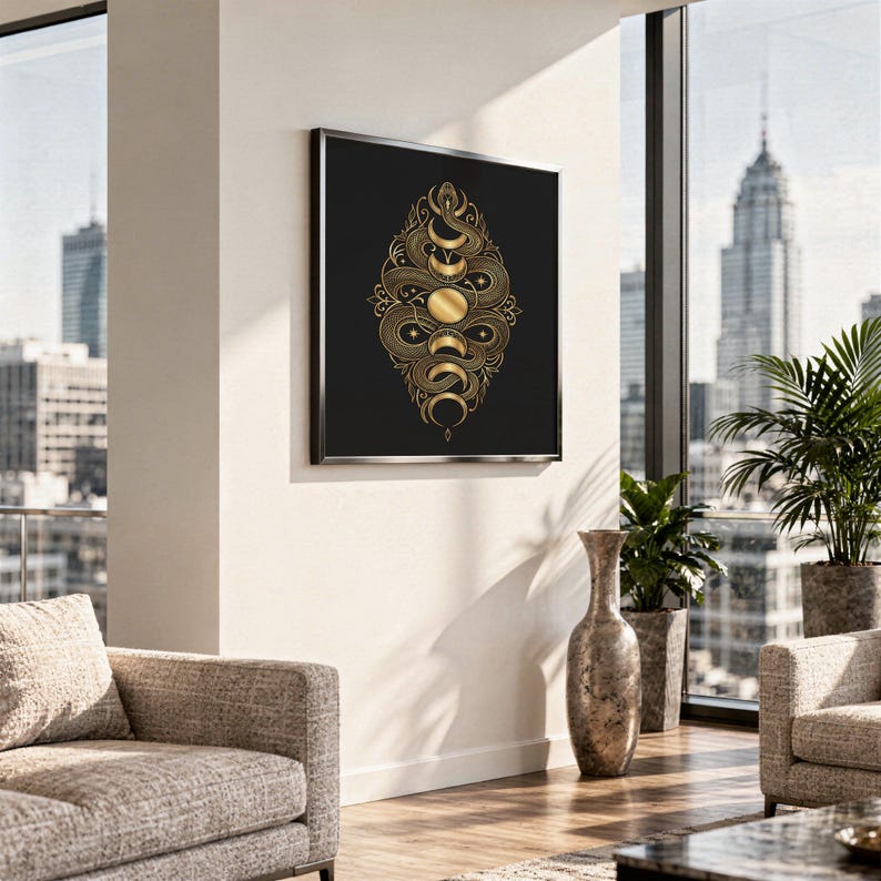 Gold snake moon phase wall art print standing on a white kitchen counter beside potted herbs.