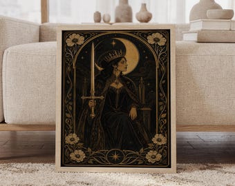 May include: A framed rectangular wall art print featuring a dark illustration of a crowned figure holding a sword. The figure sits before a large golden crescent moon against a black starry background, framed by intricate gold floral borders.