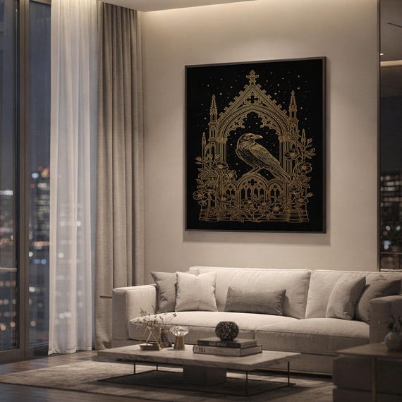 Gothic raven wall art print hanging above a light gray sofa in a modern living room with evening city views through tall windows.