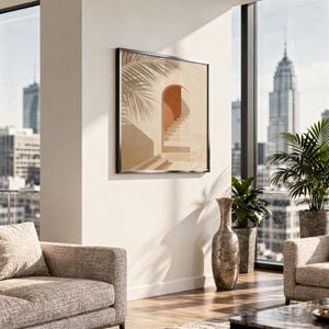 Framed palm shadow print hanging next to a large window with a city skyline view.