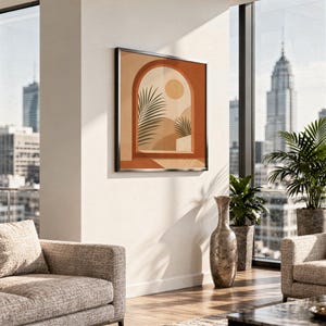 Terracotta arch window art print framed on wall above sofa in modern high rise apartment.