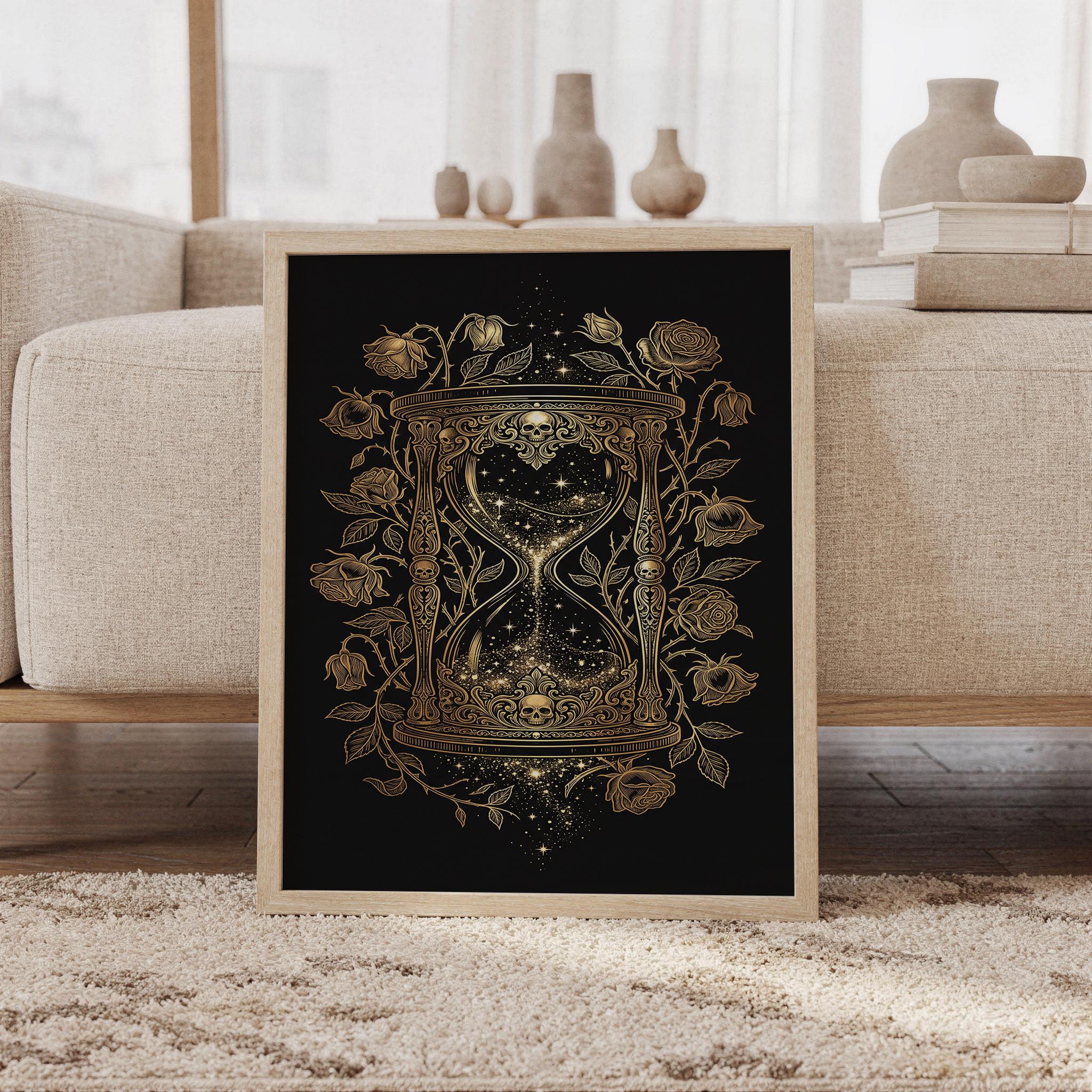 Gothic hourglass wall art print featuring intricate gold skulls, blooming and wilted roses, celestial stars, and an ornate Victorian-inspired hourglass on a deep black background, framed and leaning against a beige sofa on a textured rug in a bright Scandinavian living room.
