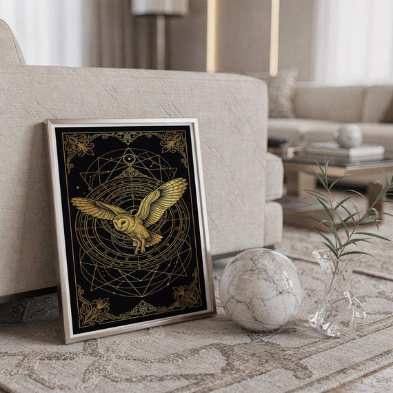 Celestial owl wall art print standing on a countertop in a modern white kitchen.