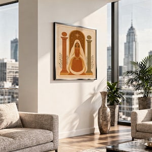 Framed earth tone arch art hanging in a bright luxury apartment living room with city skyscraper views.