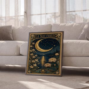 A framed Art Nouveau moon poster leans against a light fabric sofa.