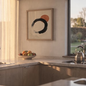 Minimalist terracotta sun and Enso circle print hanging on sunny kitchen wall