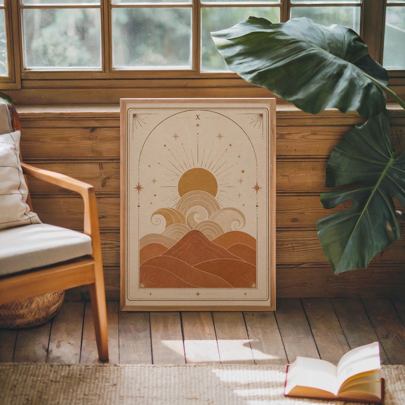 Vintage style tarot card sun poster framed in rustic room with green indoor plants.
