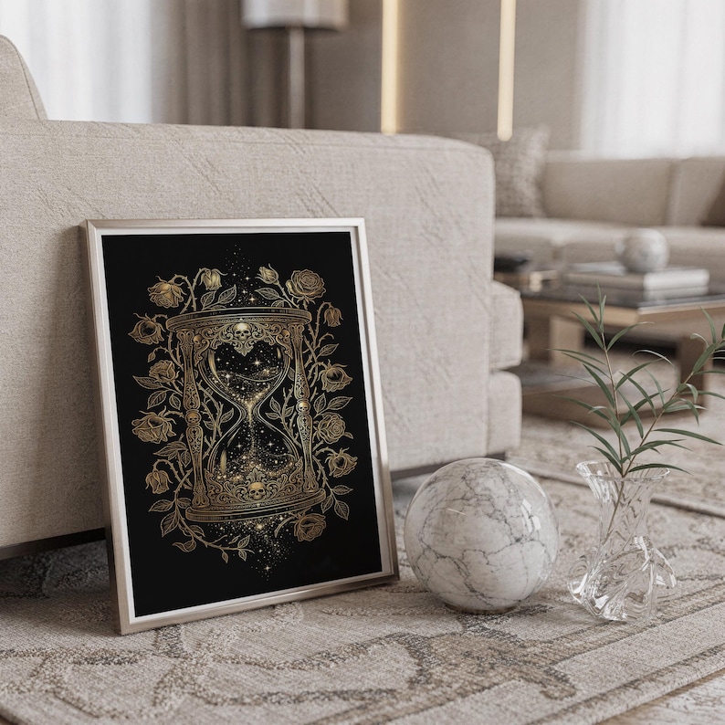 Gothic hourglass wall art print standing on a countertop in a modern white kitchen.