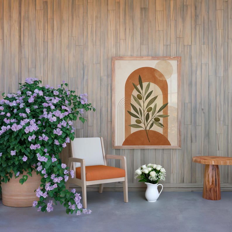 Large terracotta arch poster in cozy living room with orange armchair