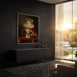 Royal cat portrait wall art print standing on a wooden desk in a home office in warm evening light.
