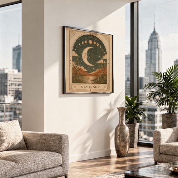 Terracotta celestial moon print framed on wall above sofa in modern high rise apartment.