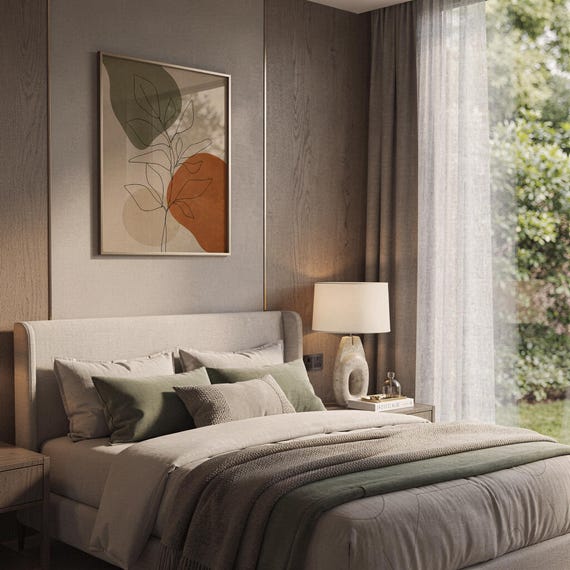 Minimalist terracotta leaf wall art framed above bed in cozy neutral bedroom